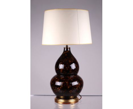 A modern design tortoiseshell glass double gourd table lamp, 44cms high excluding fittings.