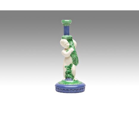 CANDLESTICK WITH PUTTI | Julius Dressler (Czech / Bohemian 1882 - 1945) | 1920-1930 | colored glazed ceramics. Putto in the s