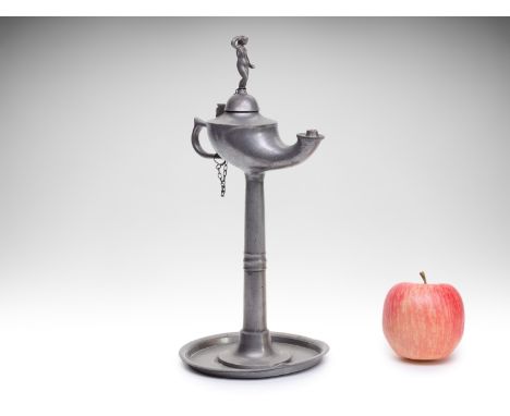 TIN OIL LAMP | Asia (19th century) | 19th century | pewter, reservoir in the shape of Aladdin's lamp, lid handle in the shape