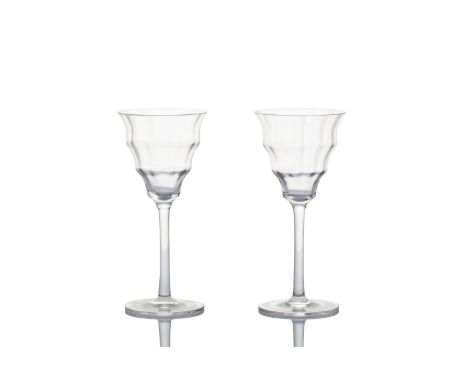 2 WINE GLASSES IN THE STYLE OF OTTO PRUTSCHER | Austria Hungary | clear glass, three rows of stepped faceted walls | 15.5 cm 