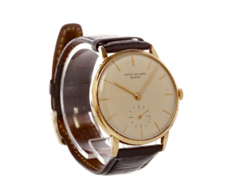 GENTLEMAN'S EIGHTEEN CARAT GOLD PATEK PHILIPPE MANUAL WIND WRIST WATCH, 1960s, the round buff dial with applied gold baton ho