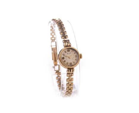 LADY'S ROTARY NINE CARAT GOLD MANUAL WIND WRIST WATCH, the round cream dial with applied baton and Arabic hour markers, 17mm 