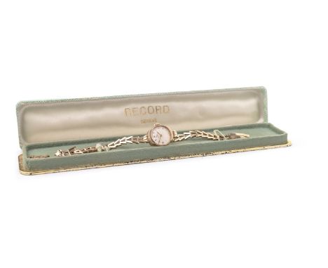 LADY'S RECORD NINE CARAT GOLD MANUAL WIND COCKTAIL WATCH, the round white dial with applied gold Arabic numerals and baton ho