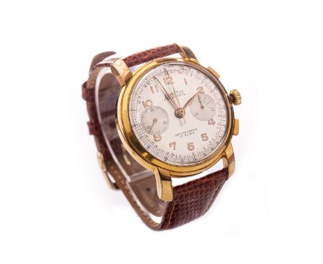 GENTLEMAN'S EXACTIS GOLD PLATED CHRONOGRAPH WRIST WATCH, the round dial with applied Arabic numerals in gold, sunken subsidia