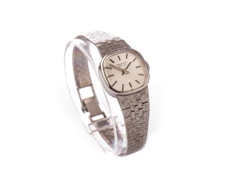 LADY'S MARVIN NINE CARAT GOLD MANUAL WIND WRIST WATCH, the square silver dial with applied silver coloured baton hour markers
