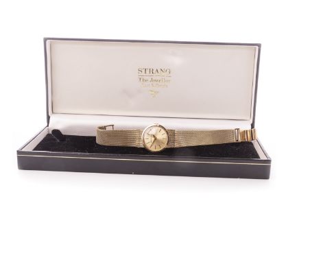 LADY'S BEUCHE GIROD NINE CARAT GOLD MANUAL WIND WRIST WATCH, the round gold coloured dial with applied gold coloured baton ho