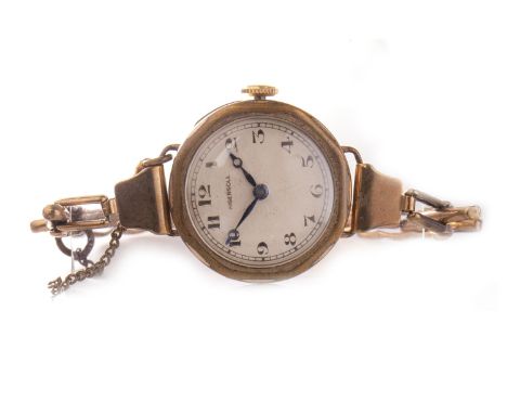 TWO LADY'S EARLY TWENTIETH CENTURY MANUAL WIND WRIST WATCHES, comprising a Cyma example with a nine carat gold case, on a gol