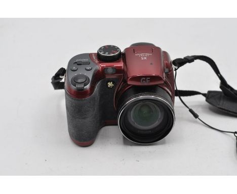 GE X5 digital camera and case.