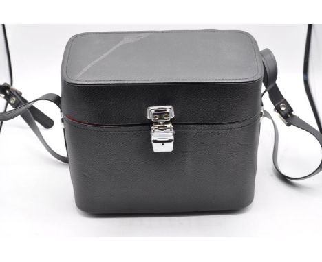 A box of empty camera cases, small bags, straps and more.