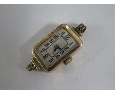 A 9ct manual wind ladies watch head, 13mm case, running and hands advance 