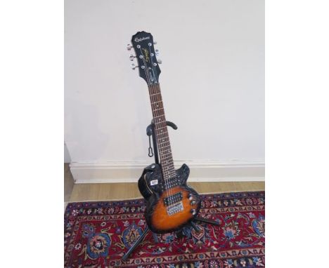 An Epiphone Special Express 6 string electric guitar and strap and stand 