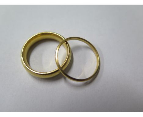 A hallmarked 916 22ct gold wedding band ring, size Q, approx 11 grams, some usage marks otherwise good and another 22ct band 