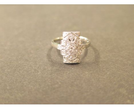 An 18ct white gold Art Deco style diamond ring, size O, diamonds are approx 0.25, marked 18K 750, in good condition 