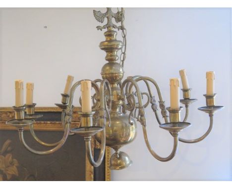 A brass eight branch hanging chandelier light, 63cm tall x 75cm wide 