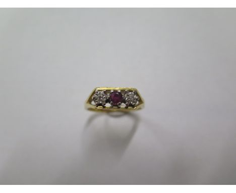 A hallmarked 18ct ruby and diamond three stone yellow gold ring, size Q/R, approx 5 grams, generally good 