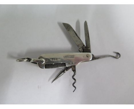 A small silver cased multi tool penknife, London 1884/85, Maker GD, 6cm long, generally good some pitting 