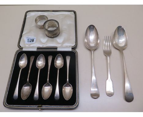 Two silver napkin rings, 2 tablespoons, a fork and a boxed set of 6 silver teaspoons, total approx 9.5 troy oz 