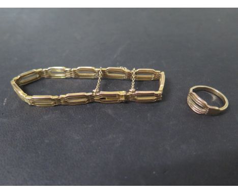 A 9ct yellow gold bracelet with a gold ring incorporating a link from the bracelet (not hallmarked), size J, approx 12.8 gram