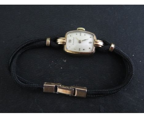 An 18ct yellow gold ladies watch manual wind, 13mm case, running, hands advance some wear to dial, total weight approx 9.8 gr