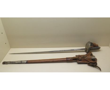 An Elizabeth II officers sword with leather scabbard AG Parker &amp; Co Icknield St Birmingham, 81cm blade, some pitting to s