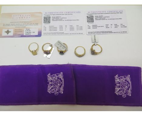 An 18ct Gemporia diamond ring, size N/O, approx 3.2 grams, and four 9ct rings, two with certificates, approx 10 grams, all go