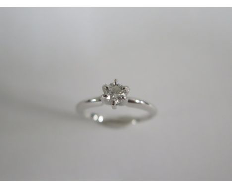 A 14ct white gold solitaire diamond ring, approx 0.25ct, size M, approx 2.5 grams, in generally good condition 