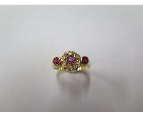 A hallmarked 18ct yellow gold three stone garnet ring, size O, approx 2.8 grams, in generally good condition, slight wear to 