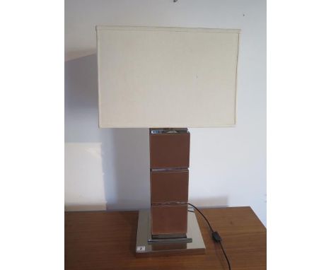 A designer chrome and leather effect table lamp, 85cm tall 