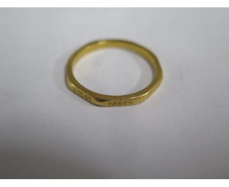 A 22ct hallmarked yellow gold band ring, size L, approx 2.3 grams 