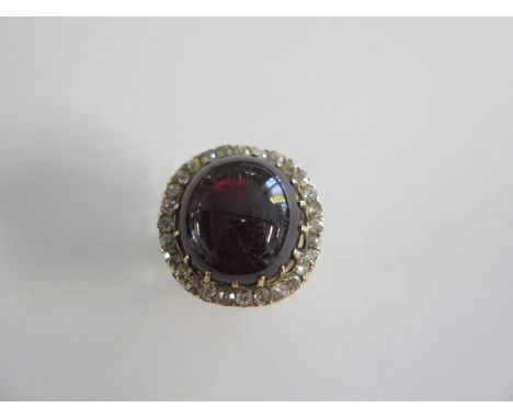 A yellow gold cabouchon shape and diamond ring, head approx 20mm x 7mm, size J/K, approx 11.2 grams, tests to approx 9ct, som