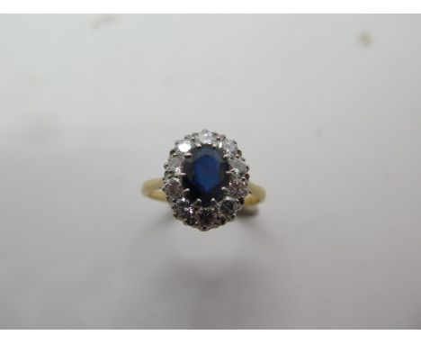 An 18ct yellow gold sapphire and diamond ring, diamonds approx 1.00ct, ring size R, head size 15mm x 12mm, in good condition 