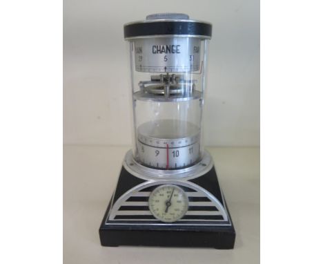 An unusual Art Deco 8 day cylinder clock with barometer and thermometer, 16cm tall, clock runs, thermometer working, baromete