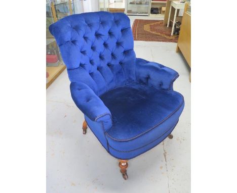 A reupholstered Victorian button back armchair, 95cm tall x 82cm wide, in good condition