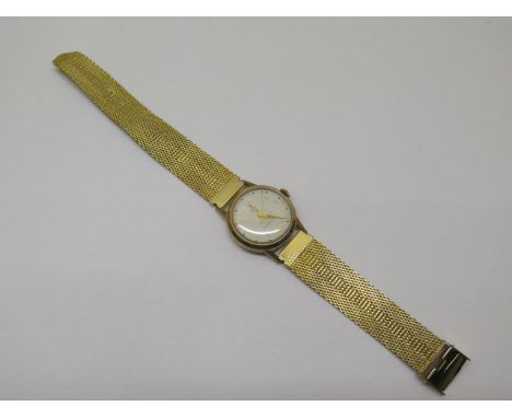 A Tudor royal 9ct mid size manual wind wristwatch on a plated strap, 3cm case, running, hands advance, some usage marks 