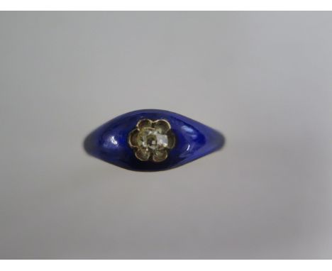 A yellow gold diamond and blue enamel ring, size M, approx 2.8 grams, generally good, small ding and scratches to enamel 