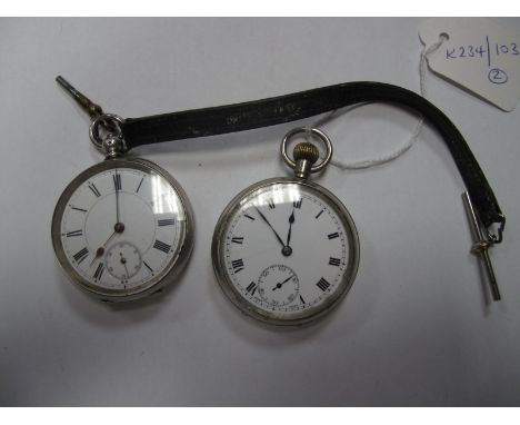 A Continental Cased Openface Pocketwatch, the dial with black Roman numerals and seconds subsidiary dial, within engine turne