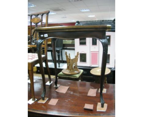 A 1920's Mahogany Card Table, with swivel top on cabriole legs, having carved knees. 