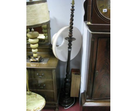 A 1920's Oak Standard Lamp, with a turned pedestal on a circular base.