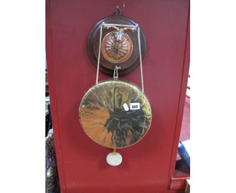 Brass Dinner Gong, circa 1920's, with copper and brass stag on circular oak mount, and beater.