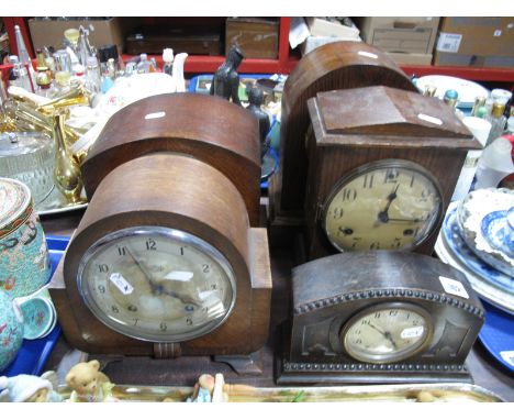 A XX Century Waterbury U.S.A Oak Cased Domed Top Mantel Clock, with circular dial, Roman numerals; together with another Wate