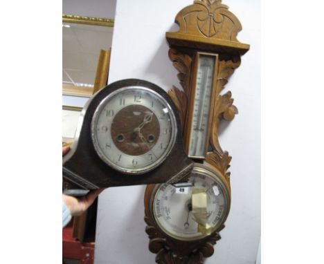 An Early XX Century Oak Aneroid Barometer; together with a Smiths oak cased mantel clock. (2)