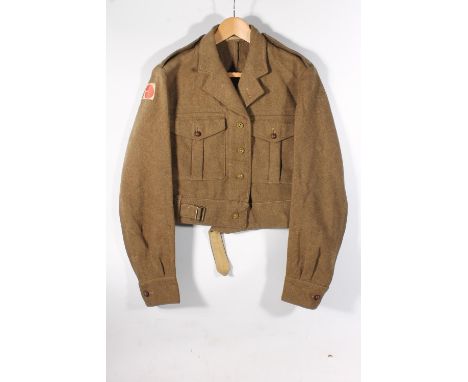 Post WWII battle dress blouse 1949 pattern with interior label 'Hepworths Ltd 1954, Size No.11', penned to the trim 'McDonald