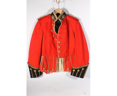 British Army uniform, five scarlet red doublet jackets to include: Jacket with bullion wire chevron insignia for the rank of 