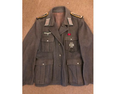 WWII Nazi German Third Reich uniform Wehrmacht jacket having interior pocket label 'M Traonouez Costumier Paris', bullion wir