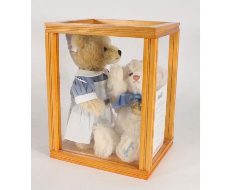 Steiff 664113 George The Royal Baby Bear, a Danbury Mint exclusive, with certificate of authenticity tag, 26cm, and Steiff 69