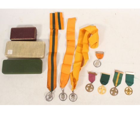 Boy Scouts interest, four Scout Leaders acorn silver badges by Collins of London to include [F G DEANS 23-4-35], [J P SMALL 2