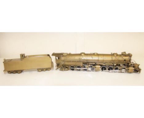 United Scale Models of Tokyo Japan, a 2-8-8-2 locomotive and tender with golden finish, without box.