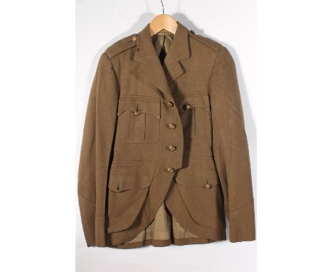 British Army uniform, five khaki green brown jackets to include: Jacket with W Jardine & Sons Ltd penned 'P Redwood 18.2.64' 