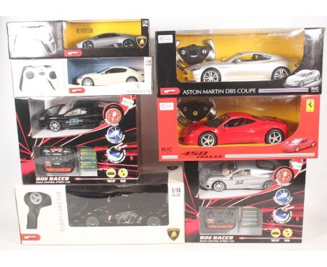 Seven remote control model cars to include Rastar 1:14 scale CV0003 Ferrari 458 Italia and Rastar 1:14 scale DT0005 Aston Mar