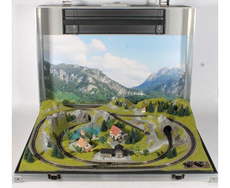 N gauge model railways, Noch of Germany 88410 Modellbahnkoffer Fussen (Briefcase Layout "Füssen"), the landscape is modelled 